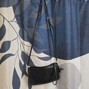 Coach Sleek Black Leather Crossbody Bag with Adjustable Strap